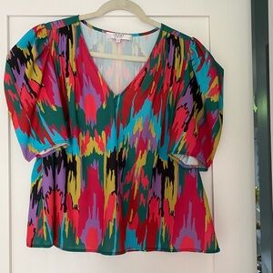 Crosby top. 100% polyester. Size large.